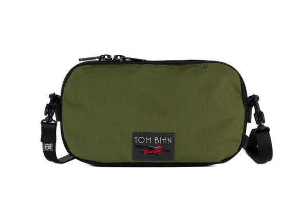 The Bantam in Olive Parapack and Coyote 210 Ballistic shell with shoulder strap